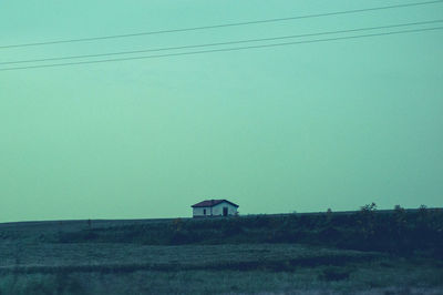 Scenic view of landscape against blue sky