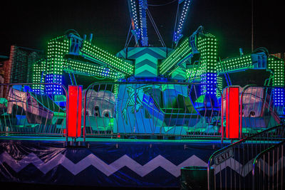 Low angle view of illuminated city at night