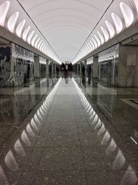 People in corridor of building
