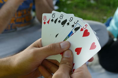 Close-up of hand holding hands