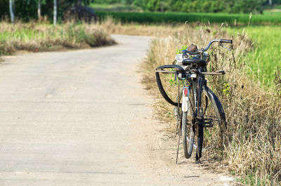 Bicycle parked on field