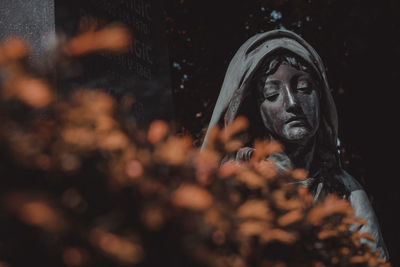 Close-up portrait of statue of woman