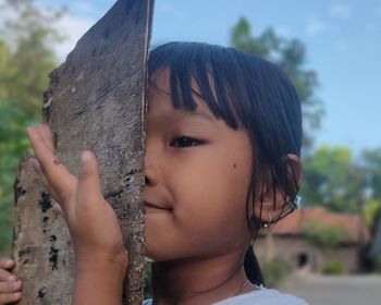 Close-up portrait of boy looking at camera