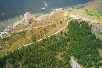 Aerial view of the medieval castle of rocca calascio with the abruzzo church