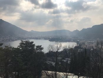 Scenic view of mountains and lake against sky