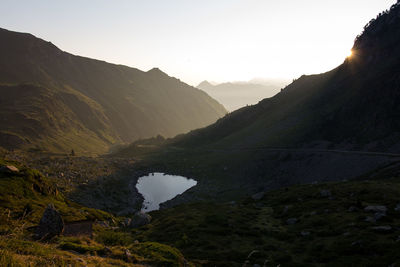 Scenic view of mountains against sky during sunset