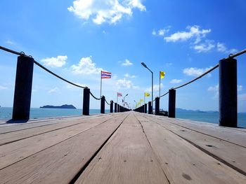 Scenic view of pier on sea against sky