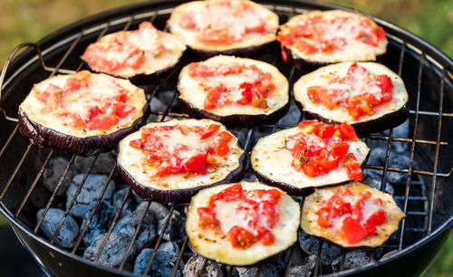 High angle view of pizza on barbecue grill