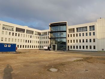 Buildings in city against sky