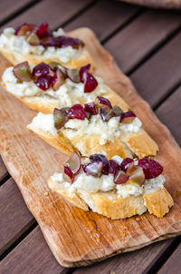 High angle view of chopped bread on cutting board