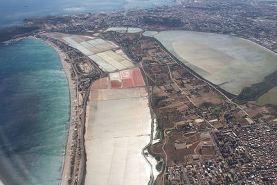 High angle view of landscape seen through airplane window