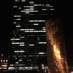 Low angle view of modern building at night