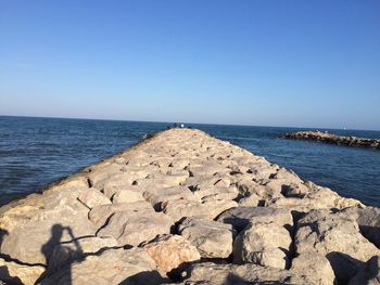 Scenic view of sea against clear sky