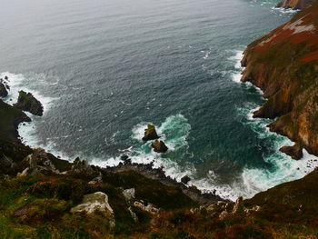 High angle view of rocks in sea