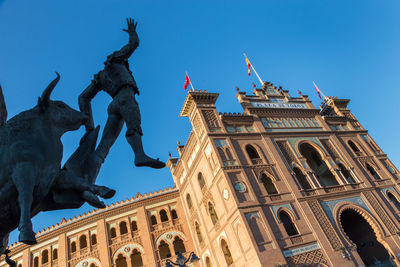 Low angle view of statue of building