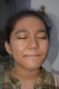 Close-up portrait of smiling woman