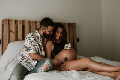 Young pregnant couple waiting for the baby. pregnancy session