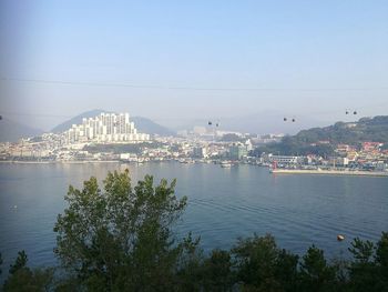 Scenic view of cityscape against clear sky