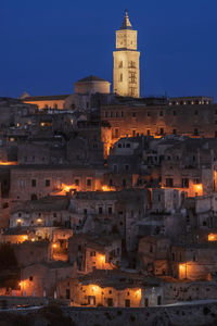 Buildings in city at night