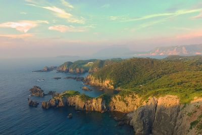 Scenic view of sea against cloudy sky