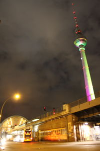 Low angle view of illuminated street light at night