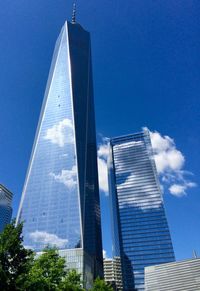 Low angle view of modern buildings against sky