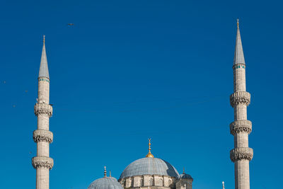 Low angle view of mosque against sky