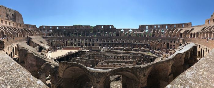 High angle view of amphitheater against blue sky