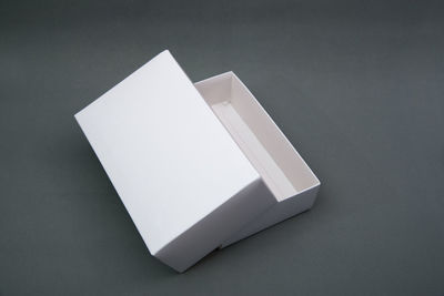 High angle view of paper on white background