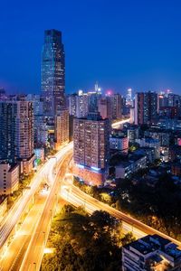 High angle view of illuminated cityscape at night