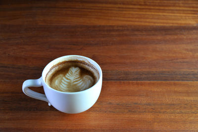 Coffee cup on table