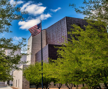 Low angle view of buildings against sky in city