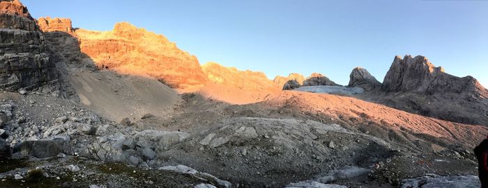 Scenic view of rocky mountains against clear sky