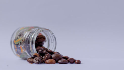 Close-up of ice cream in glass jar on table