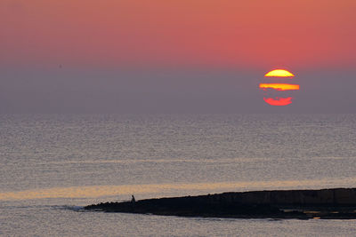 Scenic view of sea during sunset