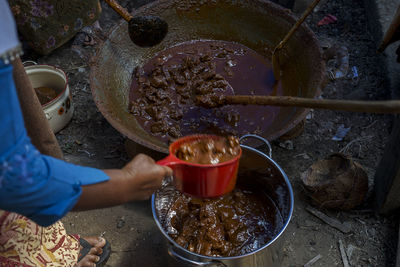 High angle view of man preparing food