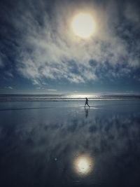 View of calm beach against the sky