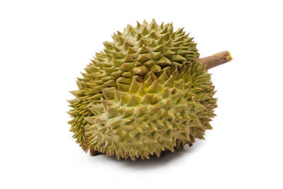 Close-up of fruits against white background