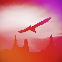 Low angle view of kite flying in sky