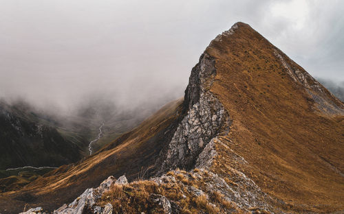 Scenic view of mountain range against sky