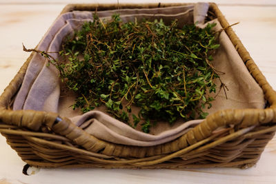 Close-up of wicker basket on table