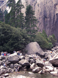Woman standing on rock formation