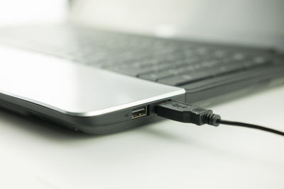 Close-up of laptop on table