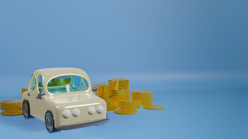 Close-up of toy car against blue background