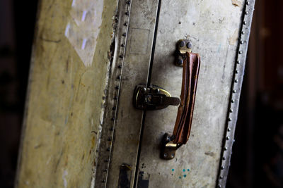 Close-up of padlock on door