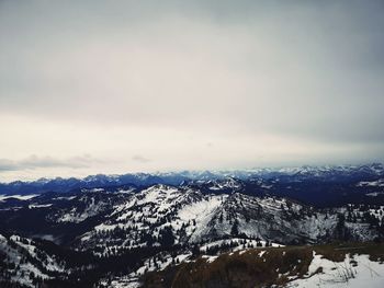 Snow covered mountain against sky