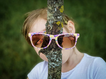 Portrait of girl wearing sunglasses