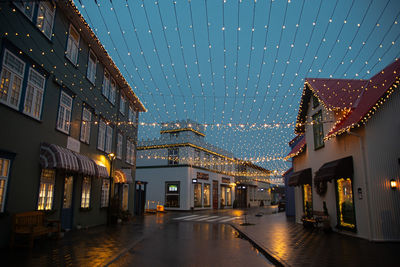 Illuminated buildings in city at night