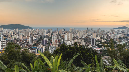 High angle view of townscape against sky during sunset