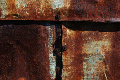 Full frame shot of rusty metal door